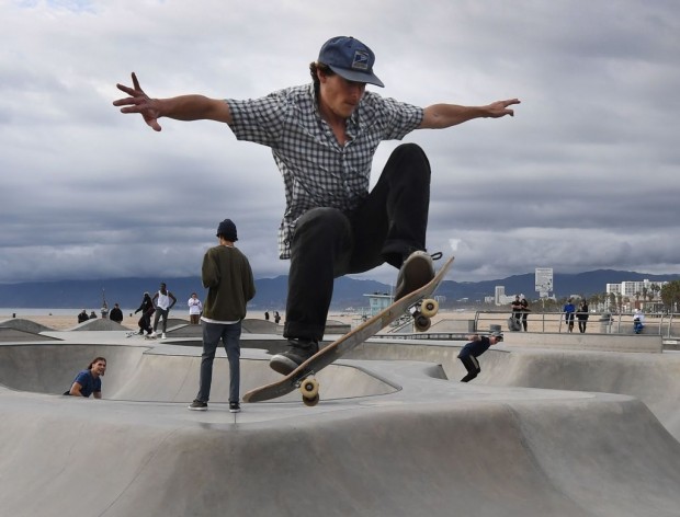 A skateboarder gets air at the Venice Beach Skate Park in Venice Beach, California on February 1, 2019, - The 16,000 sq. foot skatepark which cost $3.5 million to build is situated next to the iconic Muscle Beach in Venice. 