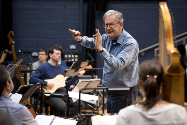 In this photograph taken on April 5, 2017, British composer Sir John Eliot Gardiner conducts the orchestra during a rehearsal session at Sadler's Wells Theatre in London