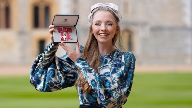 'TikTok' organist Anna Lapwood with her MBE medal, presented to her by Princess Anne at Windsor Castle