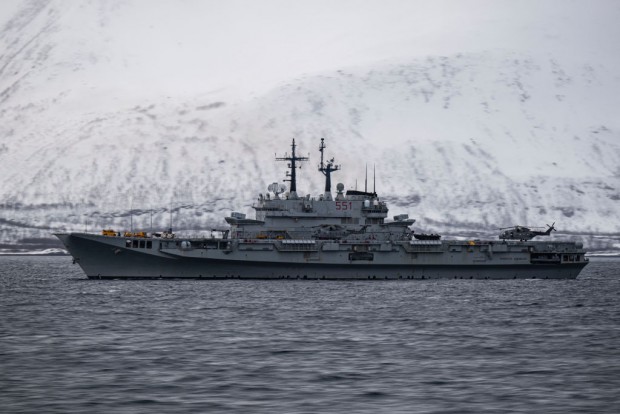The Giuseppe Garibaldi, an Italian aircraft carrier, the first through-deck aviation ship ever built for the Italian Navy, is pictured during the Nordic Response 24 military exercise on March 10, 2024, at sea near Sorstraumen, above the Arctic Circle in Norway. Nordic Response 24 is part of the larger NATO exercise Steadfast Defender. The exercise involves air, sea, and land forces, with over 100 fighter jets, 50 ships, and over 20,000 troops practicing defensive manoeuvres in cold and harsh weather conditions. 